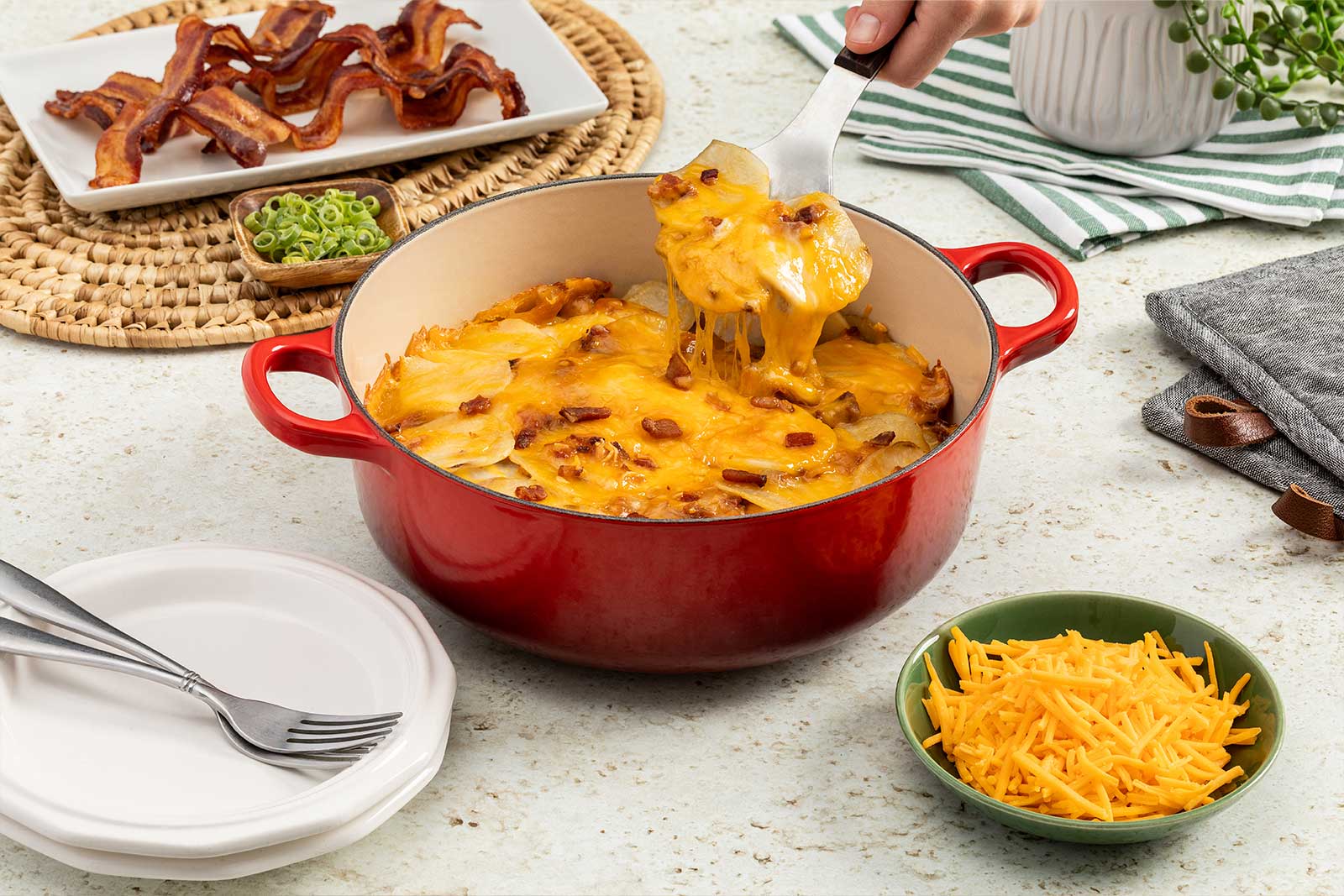 Dutch Oven Cheesy Potatoes